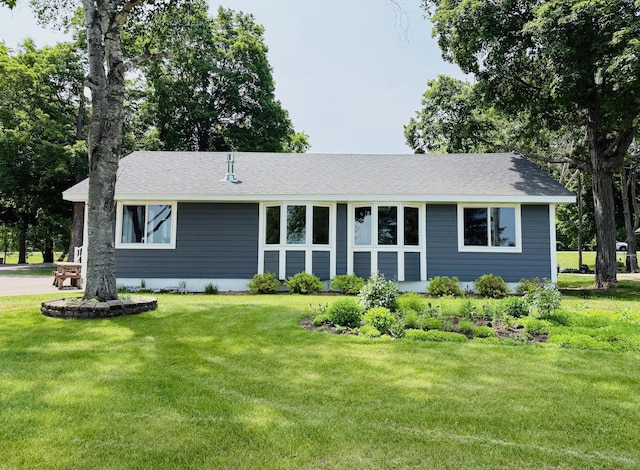 15127 Twilight Rd, Kathio Twp, MN 56359 - view of front of property with a front yard and a shingled roof