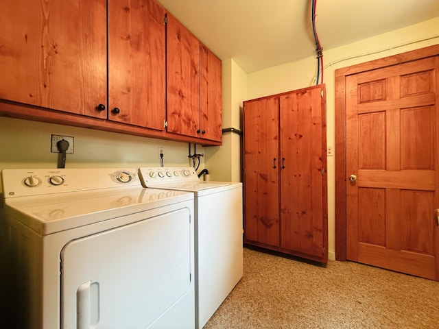 15127 Twilight Rd, Kathio Twp, MN 56359 - laundry area with cabinet space, washing machine and clothes dryer, and light colored carpet