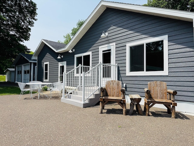 15127 Twilight Rd, Kathio Twp, MN 56359 - rear view of house featuring a patio area