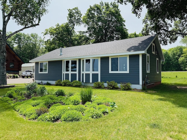 15127 Twilight Rd, Kathio Twp, MN 56359 - view of front facade with a front lawn and roof with shingles