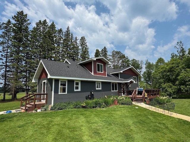 32440 Corlan Rd NE, Langor Twp, MN 56630 - view of front of home featuring a front yard, roof with shingles, and a wooden deck