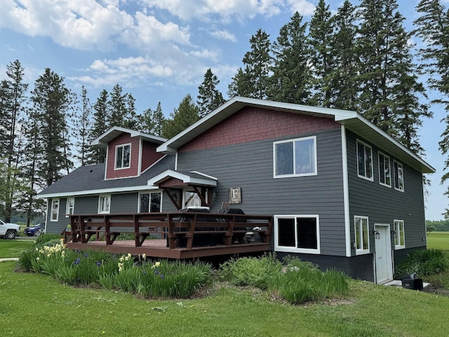 32440 Corlan Rd NE, Langor Twp, MN 56630 - back of property with a yard and a wooden deck