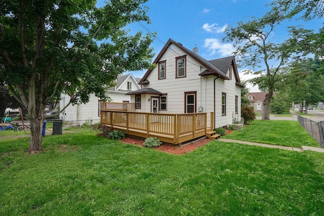 1173 Matilda St, Saint Paul, MN 55117 - back of house featuring a wooden deck, a chimney, and roof with shingles