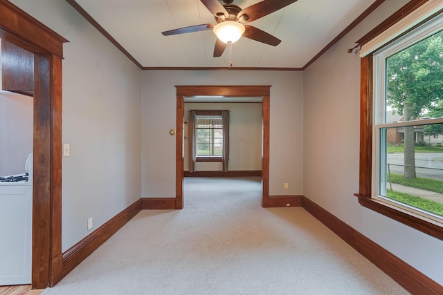 1173 Matilda St, Saint Paul, MN 55117 - spare room with ornamental molding, light carpet, and a ceiling fan