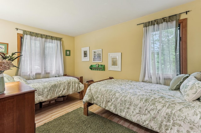 2225 Antler Lake Ct, Milltown, WI 54858 - bedroom with wood finished floors