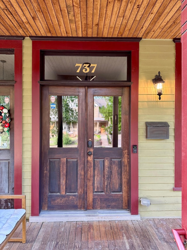 737 5th St E, Saint Paul, MN 55106 - doorway to property with covered porch and french doors