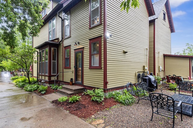 737 5th St E, Saint Paul, MN 55106 - view of property exterior with a patio