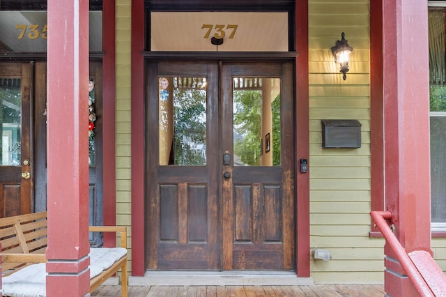 737 5th St E, Saint Paul, MN 55106 - doorway to property featuring french doors and covered porch