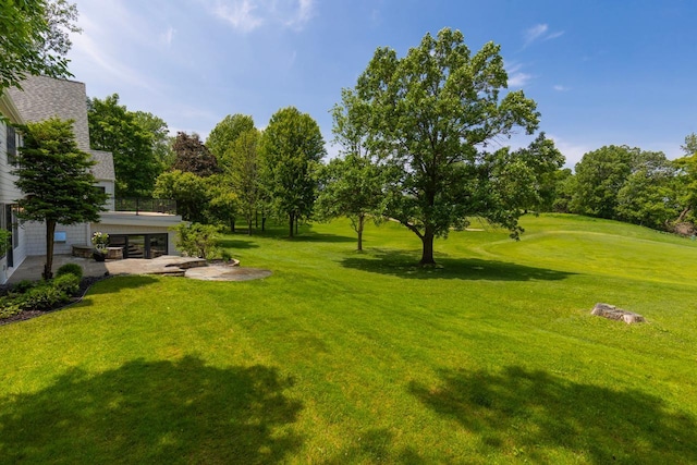 4603 Merilane Ave, Edina, MN 55436 - view of green lawn with a patio, view of wooded area, and golf course view