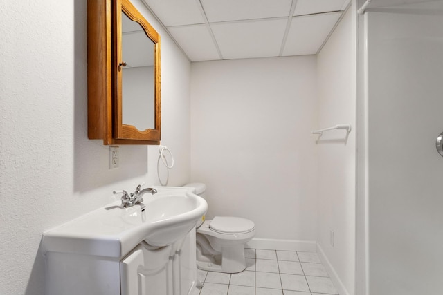 2131 111th Ln NW, Coon Rapids, MN 55433 - bathroom with tile patterned flooring, a paneled ceiling, and vanity