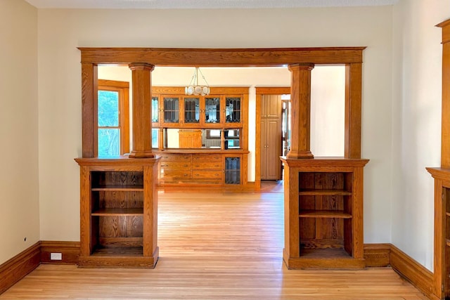 3140 Fremont Ave S, Minneapolis, MN 55408 - hallway featuring wood finished floors and a chandelier
