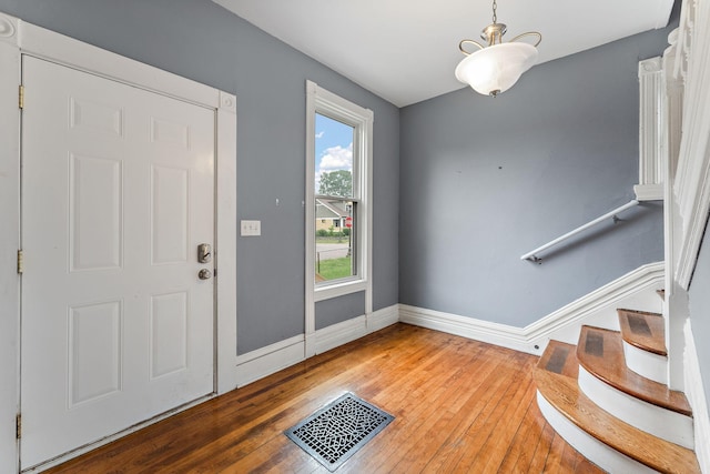 984 Iglehart Ave, Saint Paul, MN 55104 - foyer featuring wood-type flooring and stairs