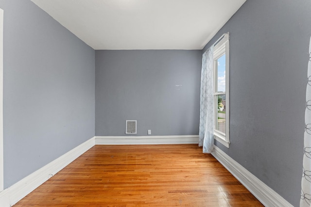 984 Iglehart Ave, Saint Paul, MN 55104 - spare room with baseboards and light wood-type flooring