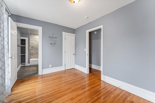984 Iglehart Ave, Saint Paul, MN 55104 - unfurnished bedroom with wood finished floors
