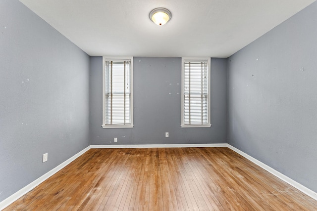 984 Iglehart Ave, Saint Paul, MN 55104 - unfurnished room featuring hardwood / wood-style flooring and plenty of natural light