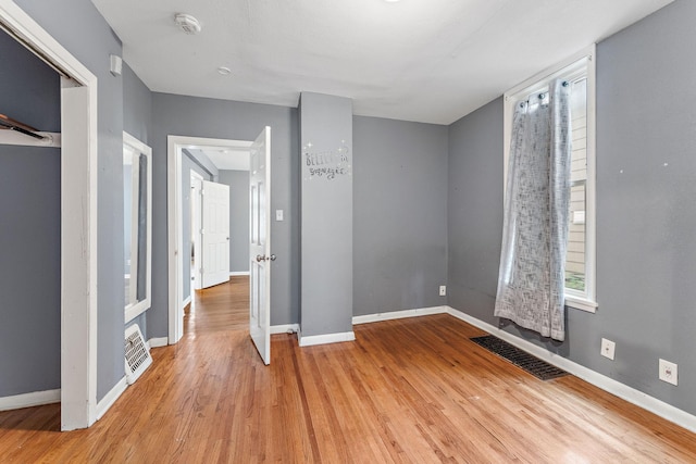 984 Iglehart Ave, Saint Paul, MN 55104 - unfurnished bedroom with light wood-type flooring and baseboards