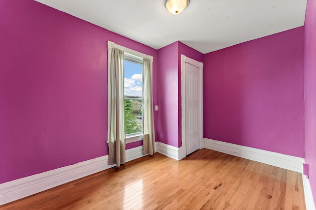 984 Iglehart Ave, Saint Paul, MN 55104 - empty room featuring baseboards and hardwood / wood-style flooring