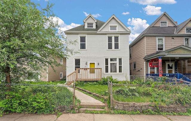 984 Iglehart Ave, Saint Paul, MN 55104 - view of front facade with a fenced front yard and a porch