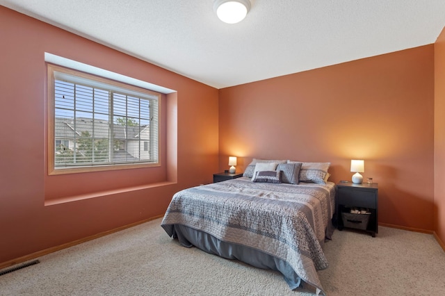 8475 121st Ave N, Champlin, MN 55316 - bedroom featuring carpet floors and baseboards