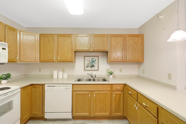 5650 Boone Ave N, New Hope, MN 55428 - kitchen with white appliances, a sink, light countertops, and hanging light fixtures