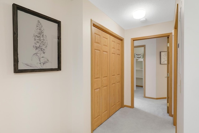 5650 Boone Ave N, New Hope, MN 55428 - hall featuring light colored carpet and baseboards
