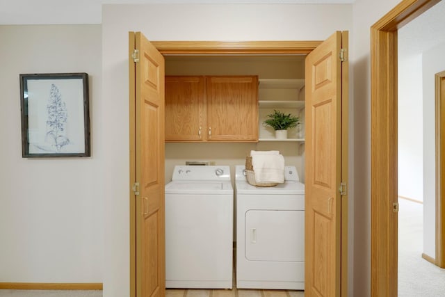 5650 Boone Ave N, New Hope, MN 55428 - laundry room with separate washer and dryer and cabinet space