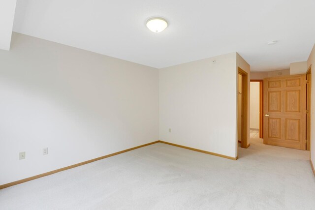 5650 Boone Ave N, New Hope, MN 55428 - empty room with light carpet and baseboards