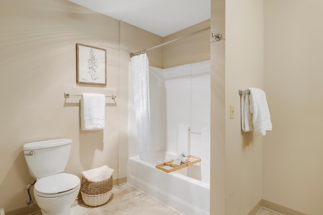 5650 Boone Ave N, New Hope, MN 55428 - bathroom with shower / bath combination with curtain, toilet, and baseboards