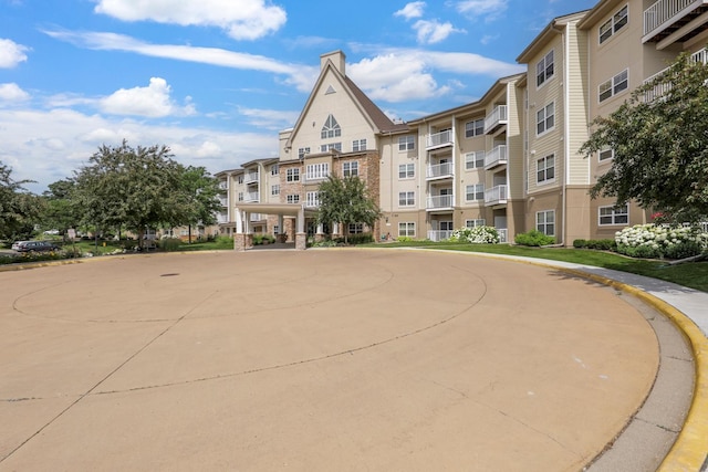 5650 Boone Ave N, New Hope, MN 55428 - view of apartment building / complex with curved driveway