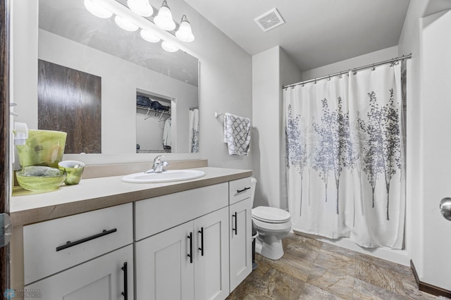 3364 27th St S, Moorhead, MN 56560 - full bathroom with stone finish floors, vanity, and curtained shower