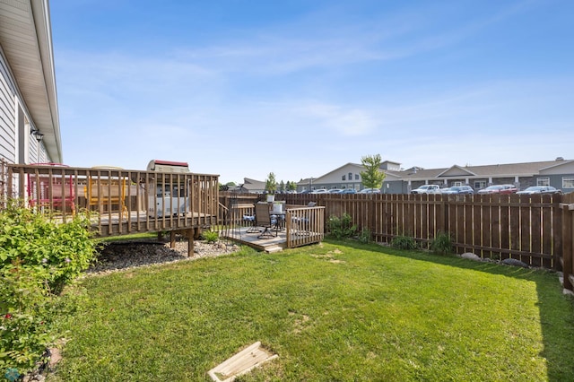 3364 27th St S, Moorhead, MN 56560 - fenced backyard with a wooden deck and a residential view