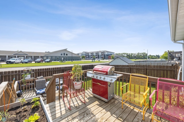 3364 27th St S, Moorhead, MN 56560 - wooden terrace featuring a residential view and grilling area