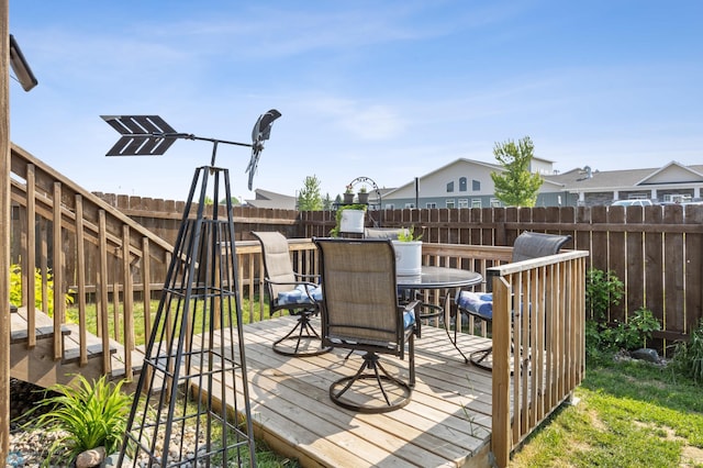 3364 27th St S, Moorhead, MN 56560 - wooden terrace featuring a fenced backyard and outdoor dining area