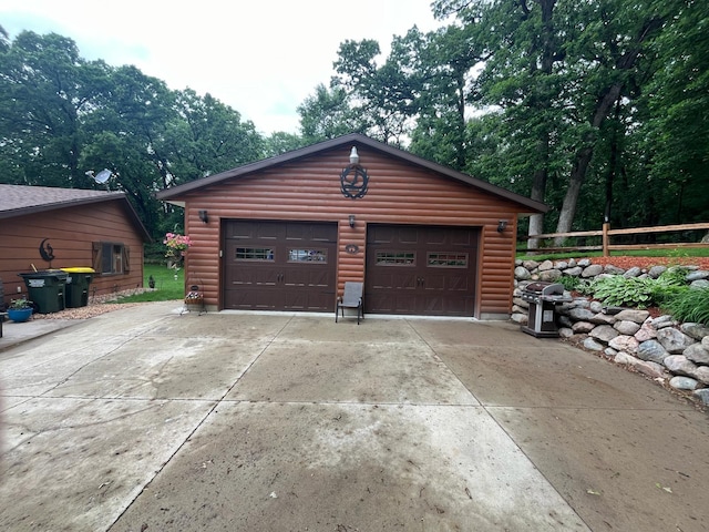 5940 150th Ave NE, New London Twp, MN 56288 - garage featuring concrete driveway