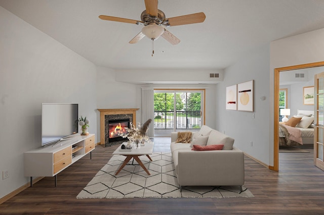 9165 Comstock Ln N Unit 106, Maple Grove, MN 55311 - living room featuring wood finished floors, a high end fireplace, and a ceiling fan