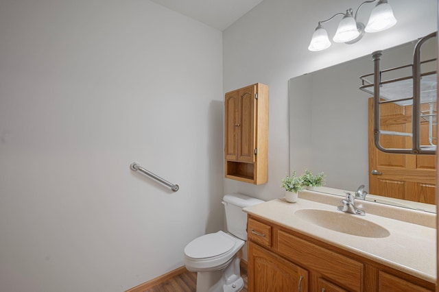 9165 Comstock Ln N Unit 106, Maple Grove, MN 55311 - half bathroom with vanity and wood finished floors