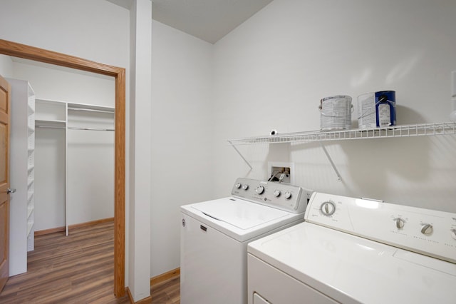 9165 Comstock Ln N Unit 106, Maple Grove, MN 55311 - washroom featuring washing machine and dryer and wood finished floors