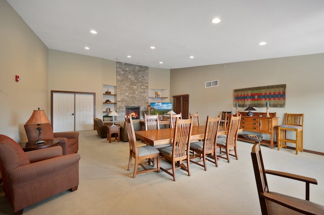 9165 Comstock Ln N Unit 106, Maple Grove, MN 55311 - dining space featuring light carpet, recessed lighting, and a fireplace
