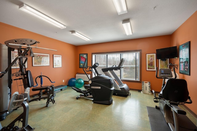 9165 Comstock Ln N Unit 106, Maple Grove, MN 55311 - workout room with tile patterned floors and baseboards