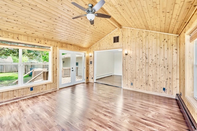 101 Sunset Dr S, Minnetonka, MN 55305 - unfurnished room featuring a baseboard heating unit, wooden walls, wood ceiling, wood finished floors, and a ceiling fan