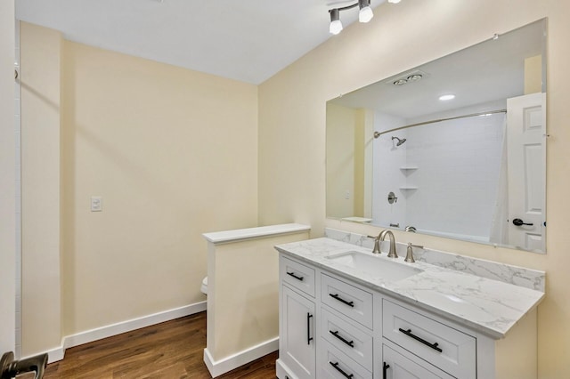 101 Sunset Dr S, Minnetonka, MN 55305 - full bath with wood finished floors, vanity, and a shower