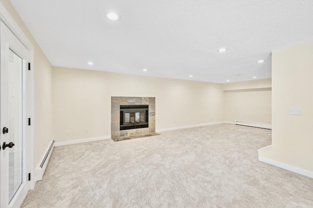101 Sunset Dr S, Minnetonka, MN 55305 - unfurnished living room featuring a baseboard heating unit, light colored carpet, recessed lighting, and a fireplace