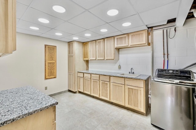 101 Sunset Dr S, Minnetonka, MN 55305 - kitchen featuring washer / dryer, light brown cabinets, recessed lighting, and light stone counters