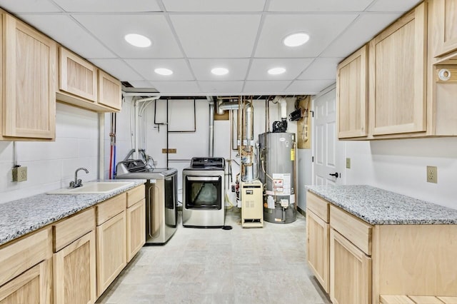 101 Sunset Dr S, Minnetonka, MN 55305 - kitchen with light brown cabinets, washing machine and clothes dryer, water heater, recessed lighting, and a drop ceiling