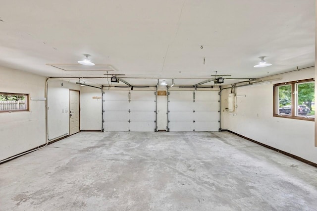 101 Sunset Dr S, Minnetonka, MN 55305 - garage with a garage door opener and electric panel