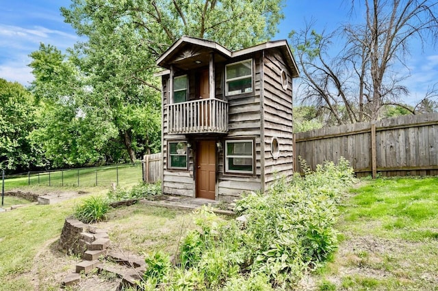 101 Sunset Dr S, Minnetonka, MN 55305 - back of property with a balcony and a fenced backyard