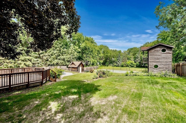 101 Sunset Dr S, Minnetonka, MN 55305 - fenced backyard with a storage unit