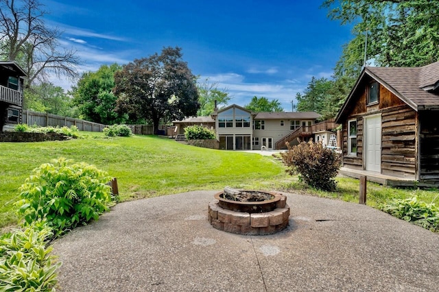 101 Sunset Dr S, Minnetonka, MN 55305 - view of yard with an outdoor fire pit, stairs, and a patio area