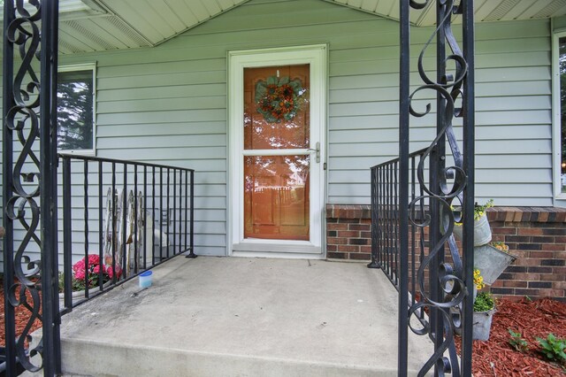 20128 554th St, Concord Twp, MN 55985 - property entrance featuring a porch