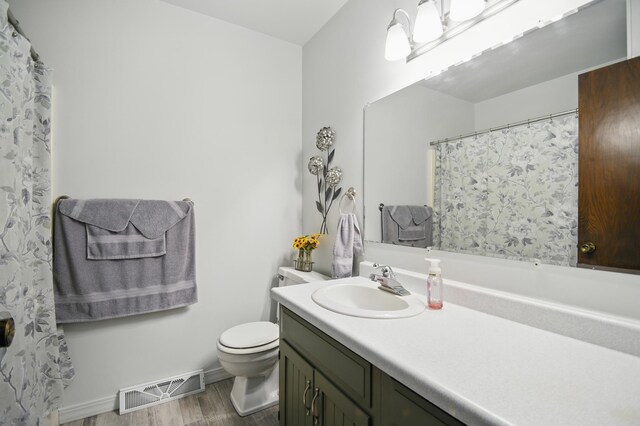 20128 554th St, Concord Twp, MN 55985 - bathroom with vanity and wood finished floors